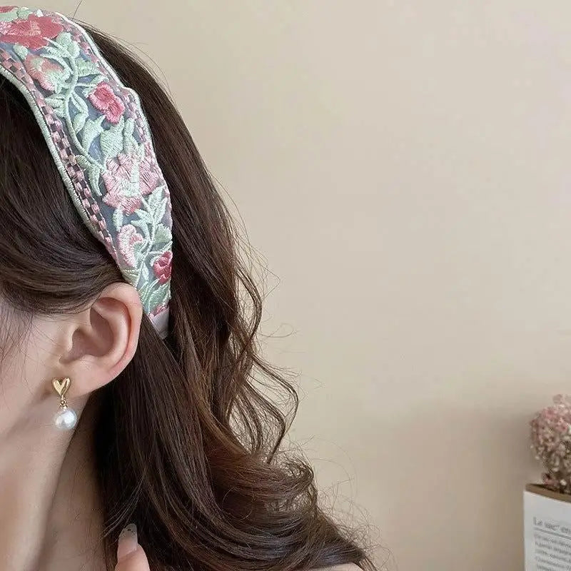 Embrace Elegance with Our Acrylic Flower Embroidered Headband