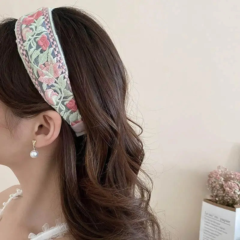 Embrace Elegance with Our Acrylic Flower Embroidered Headband