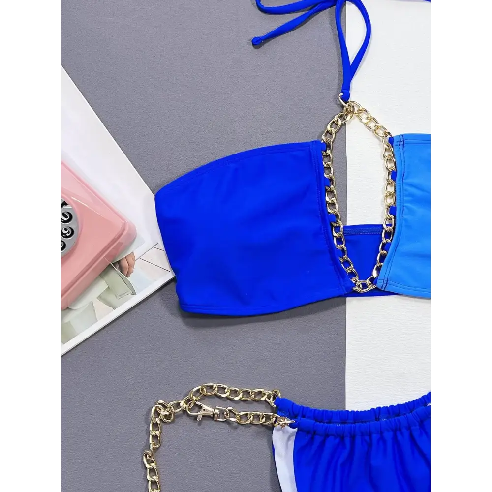 Dazzling Blue Halter Neck Bikini Set with Gold Chain Accents