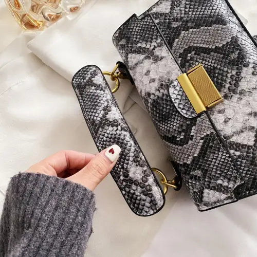 Chic Snakeskin Print Crossbody Bag with Gold Accents