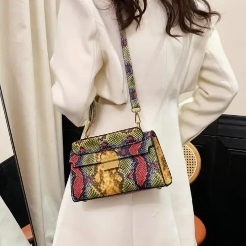 Chic Snakeskin Print Crossbody Bag with Gold Accents