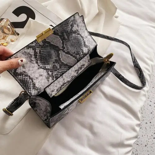 Chic Snakeskin Print Crossbody Bag with Gold Accents