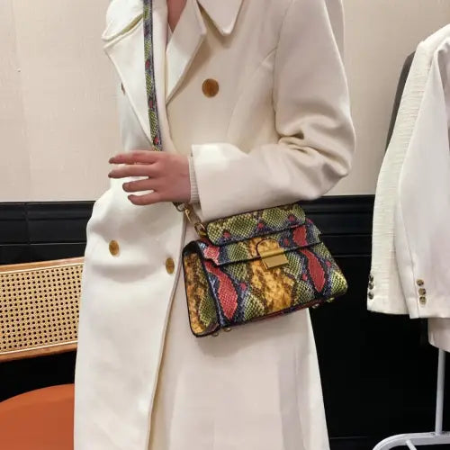 Chic Snakeskin Print Crossbody Bag with Gold Accents
