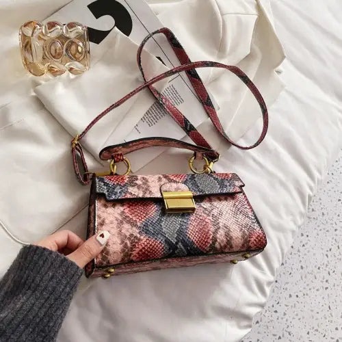 Chic Snakeskin Print Crossbody Bag with Gold Accents
