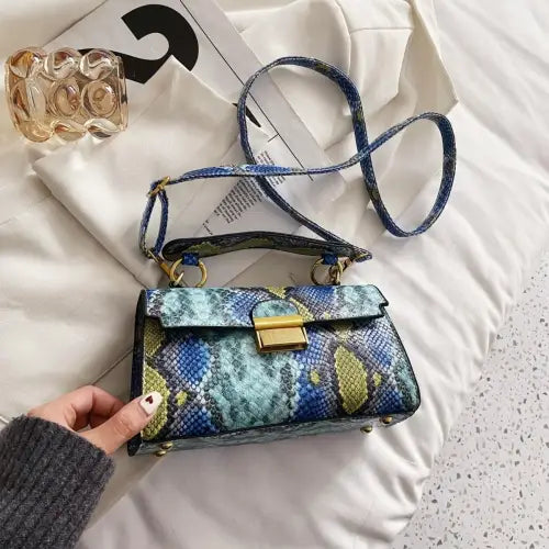 Chic Snakeskin Print Crossbody Bag with Gold Accents