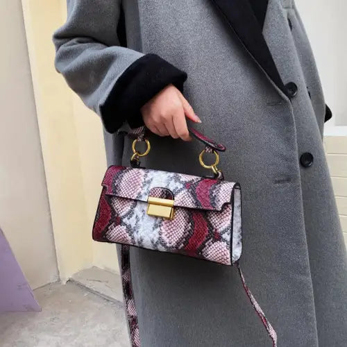 Chic Snakeskin Print Crossbody Bag with Gold Accents