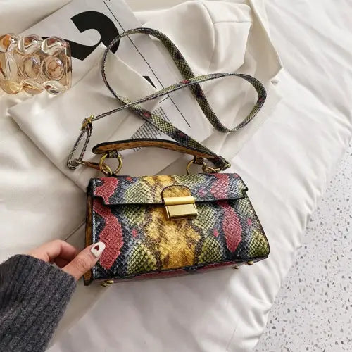 Chic Snakeskin Print Crossbody Bag with Gold Accents