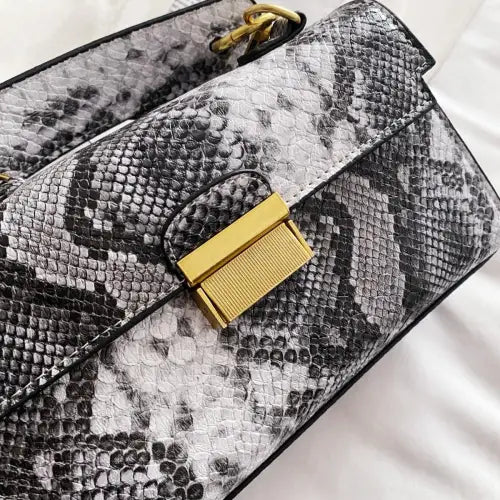 Chic Snakeskin Print Crossbody Bag with Gold Accents