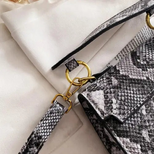 Chic Snakeskin Print Crossbody Bag with Gold Accents