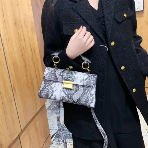 Chic Snakeskin Print Crossbody Bag with Gold Accents