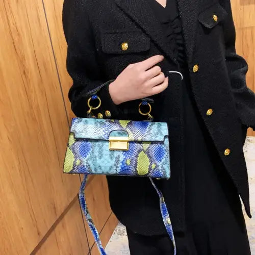 Chic Snakeskin Print Crossbody Bag with Gold Accents