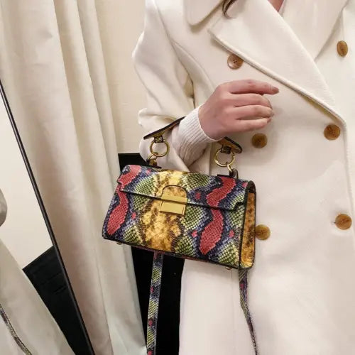 Chic Snakeskin Print Crossbody Bag with Gold Accents