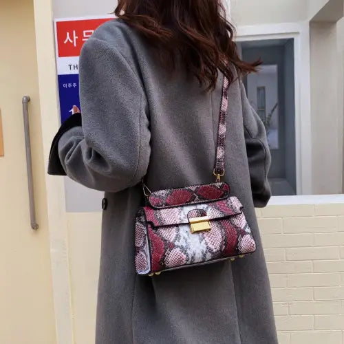 Chic Snakeskin Print Crossbody Bag with Gold Accents