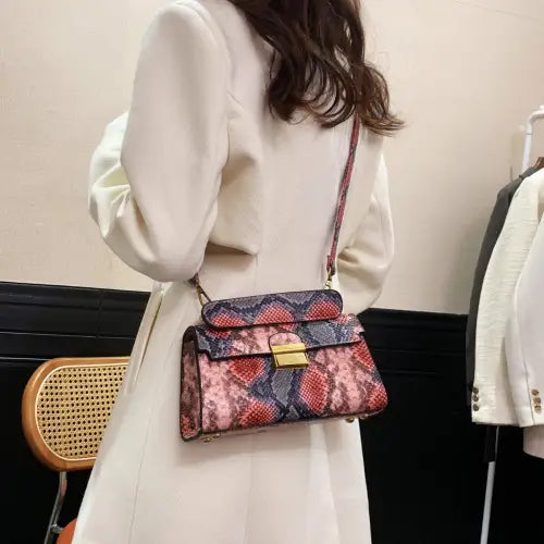 Chic Snakeskin Print Crossbody Bag with Gold Accents