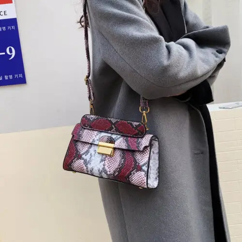 Chic Snakeskin Print Crossbody Bag with Gold Accents