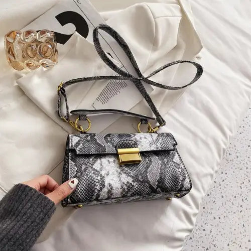 Chic Snakeskin Print Crossbody Bag with Gold Accents