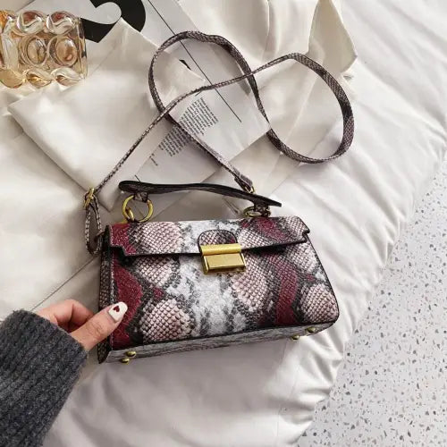 Chic Snakeskin Print Crossbody Bag with Gold Accents