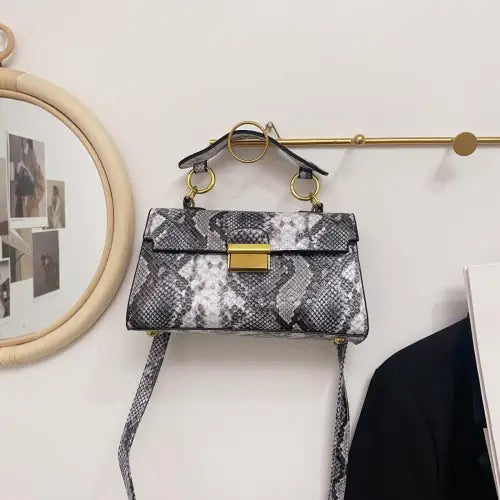 Chic Snakeskin Print Crossbody Bag with Gold Accents