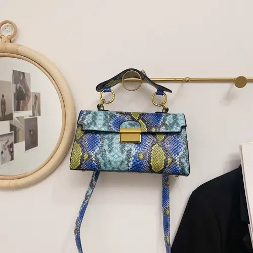 Chic Snakeskin Print Crossbody Bag with Gold Accents