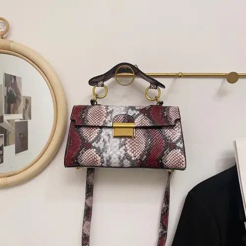 Chic Snakeskin Print Crossbody Bag with Gold Accents