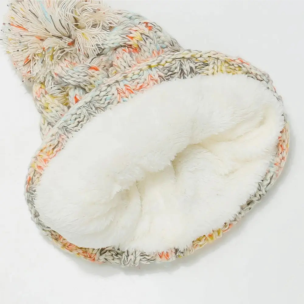 Cozy Up with the Miara Contrast Cable-Knit Hat and Pompom