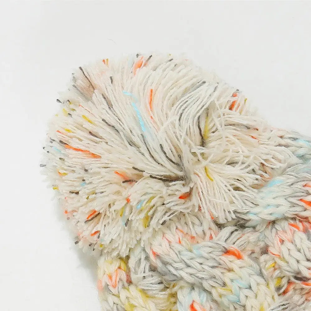 Cozy Up with the Miara Contrast Cable-Knit Hat and Pompom