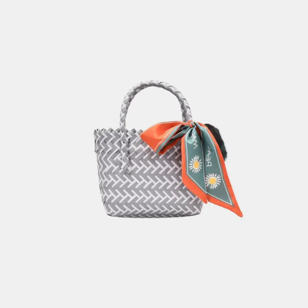 Vibrant Contrast Woven Handbag with Stylish Scarf Accent