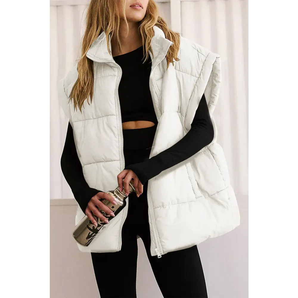 Elevate Your Style with the Black Stand Neck Oversized Puffer Vest