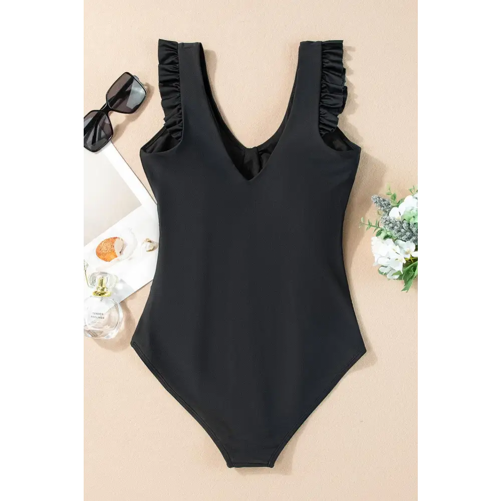 Flattering V-Neck One-Piece Swimwear with Ruched Design