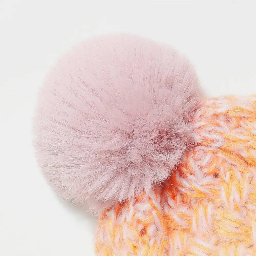 Cozy Up in Style with Miara's Gradient Knit Hat and Fluffy Pompom