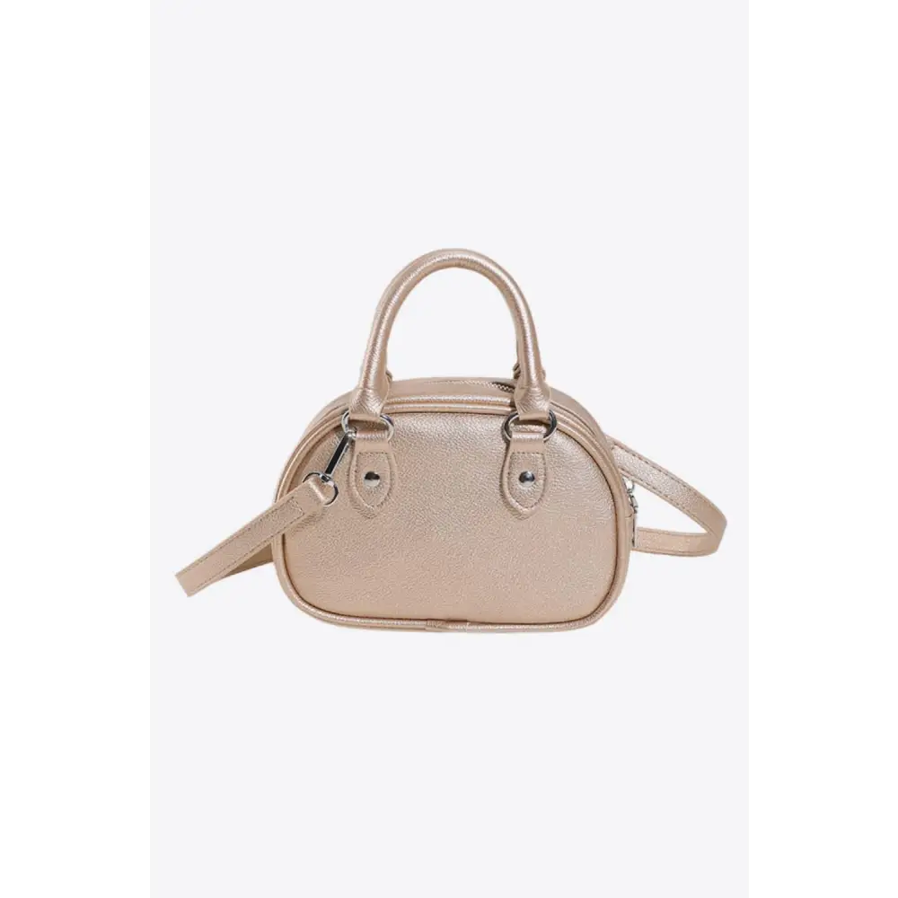 Stunning Gold Dome Leather Handbag Elevates Your Style