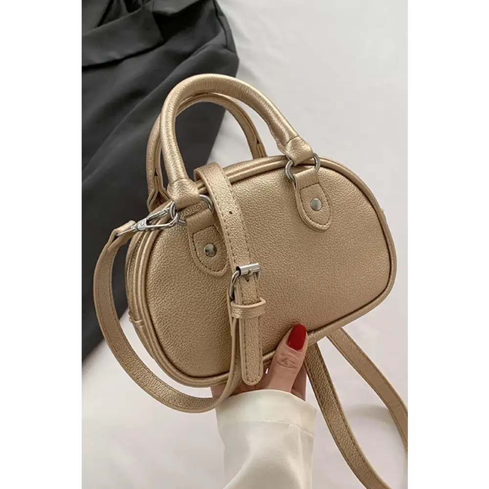 Stunning Gold Dome Leather Handbag Elevates Your Style