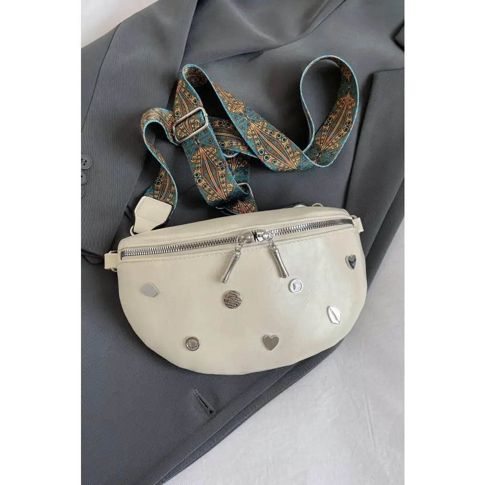 Stylish Leather Sling Bag with Unique Patterned Strap