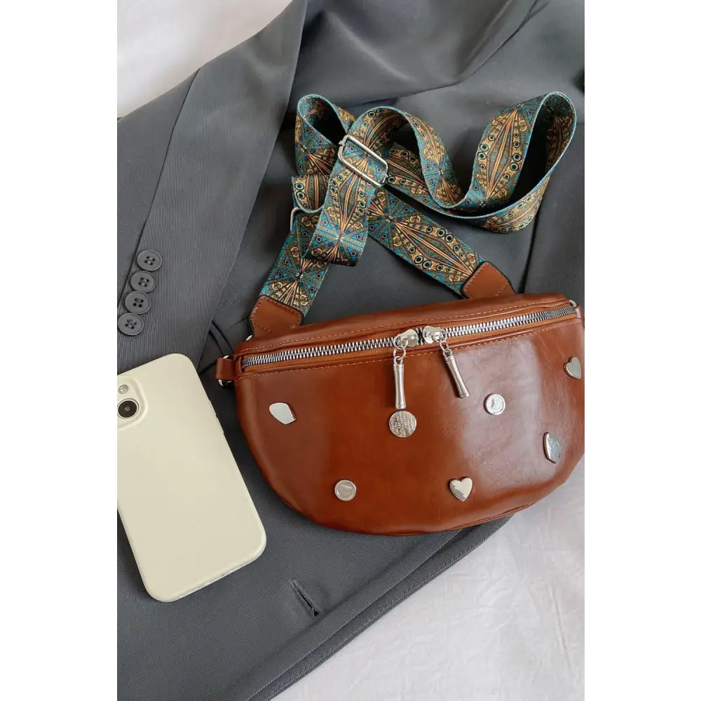 Stylish Leather Sling Bag with Unique Patterned Strap