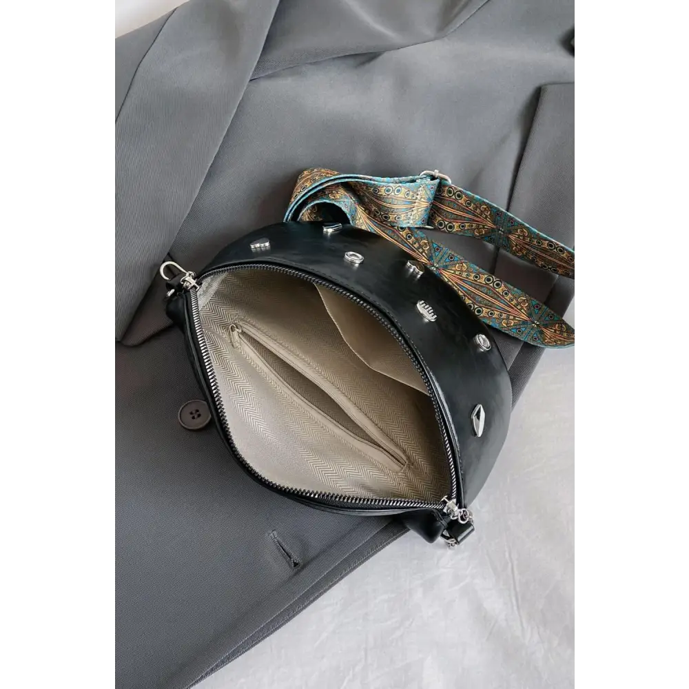 Stylish Leather Sling Bag with Unique Patterned Strap