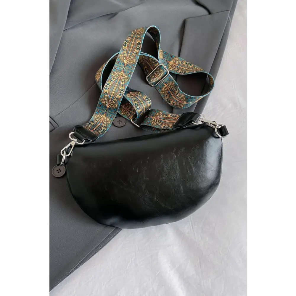 Stylish Leather Sling Bag with Unique Patterned Strap