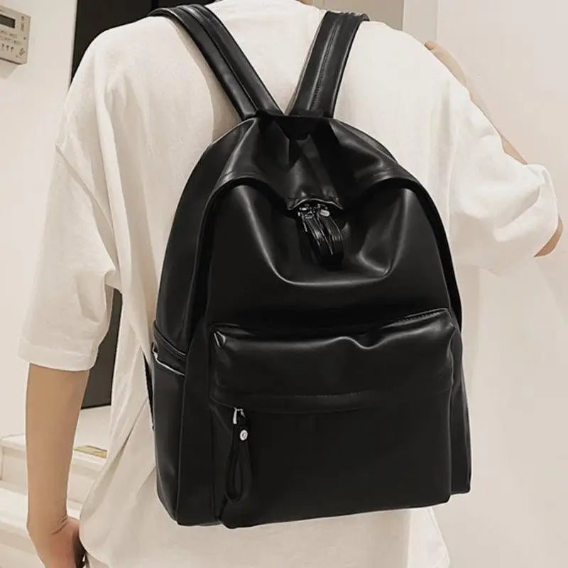 Sleek Black Leather Zip Backpack Bag with Original Tags