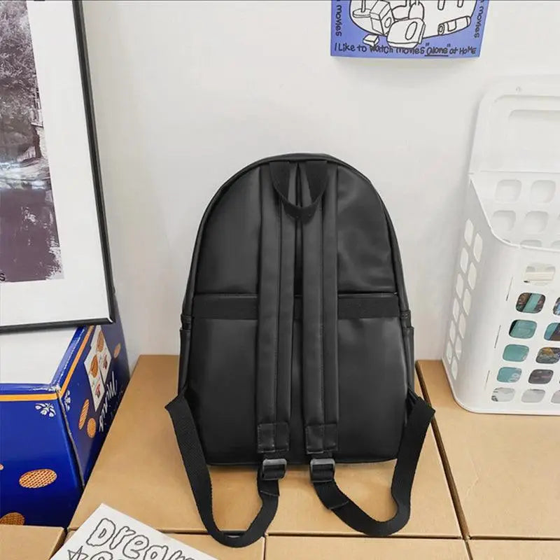 Sleek Black Leather Zip Backpack Bag with Original Tags