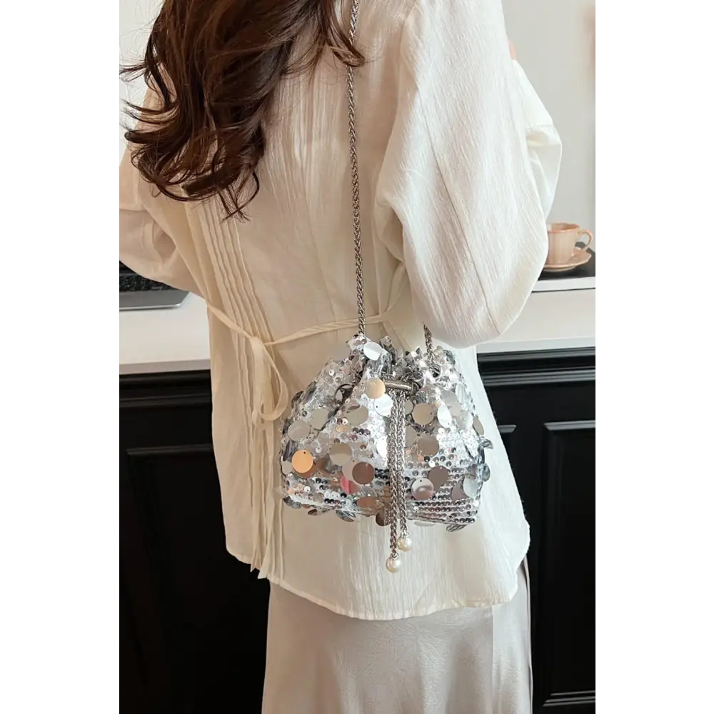 Shimmer in Style with the Yeppi Drawstring Sequin Crossbody Bag