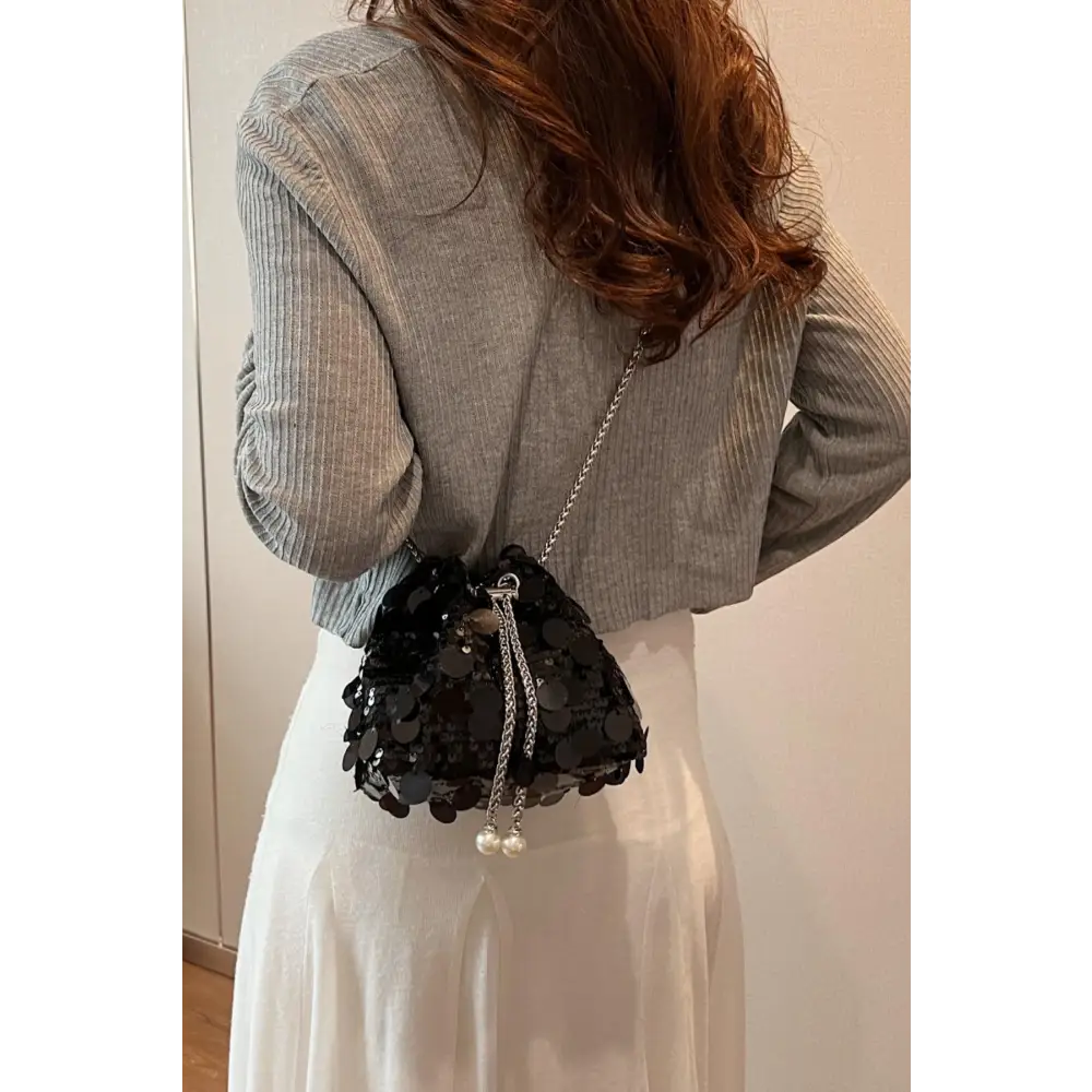 Shimmer in Style with the Yeppi Drawstring Sequin Crossbody Bag