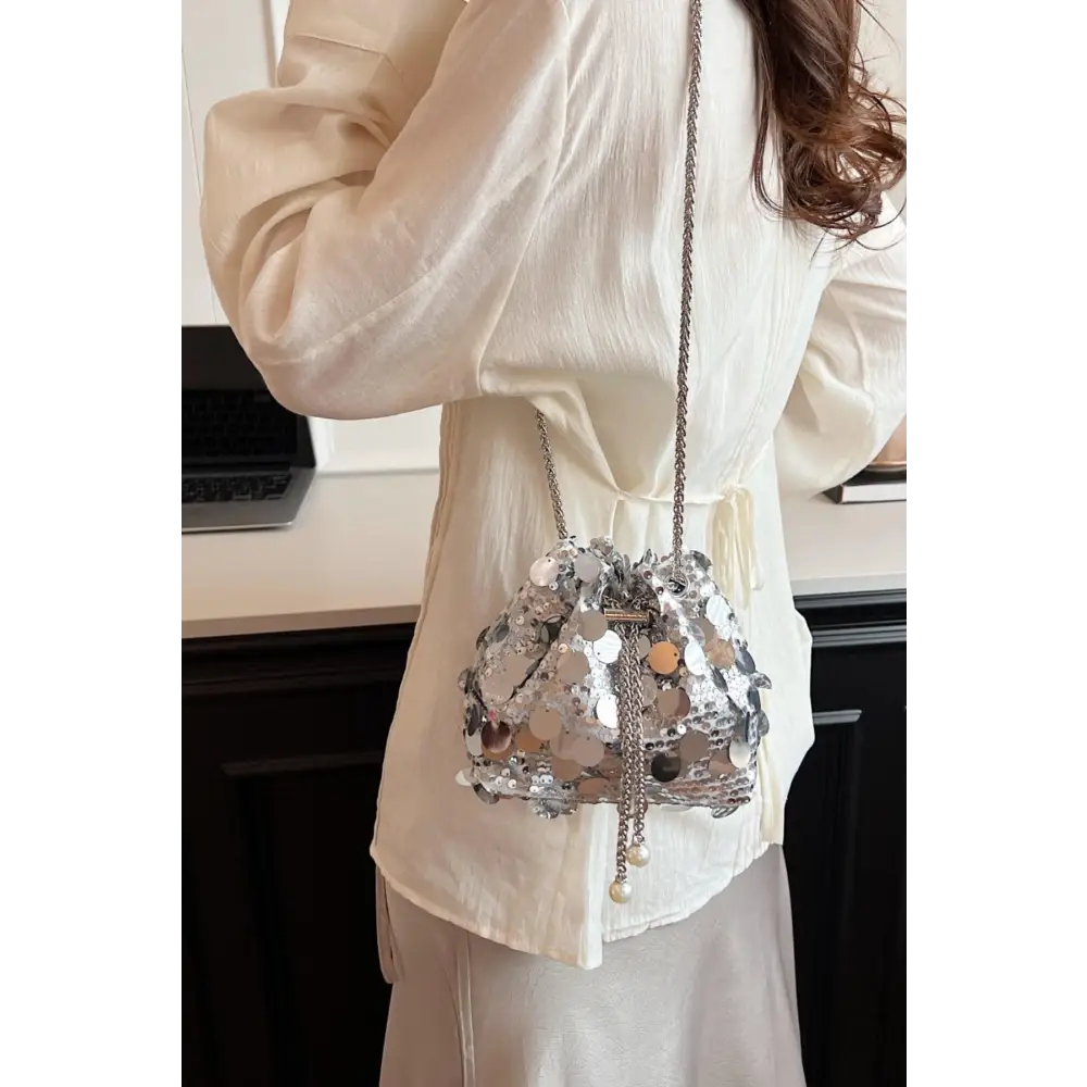 Shimmer in Style with the Yeppi Drawstring Sequin Crossbody Bag