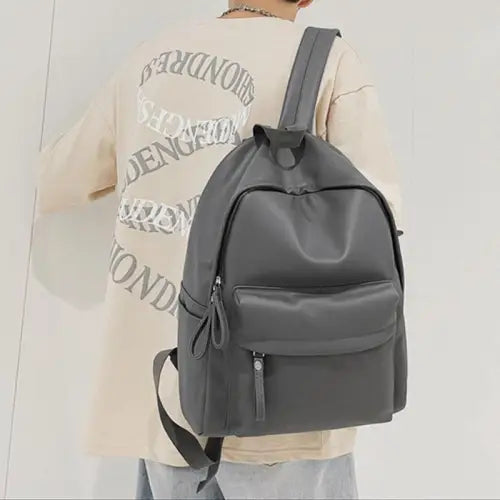 Sleek Black Leather Zip Backpack Bag