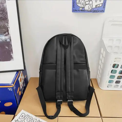 Sleek Black Leather Zip Backpack Bag