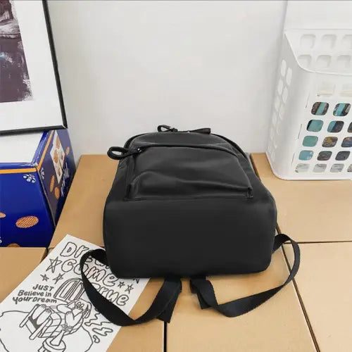 Sleek Black Leather Zip Backpack Bag