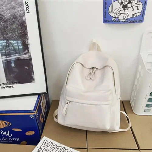 Sleek Black Leather Zip Backpack Bag