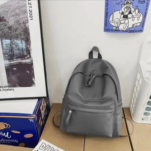 Sleek Black Leather Zip Backpack Bag