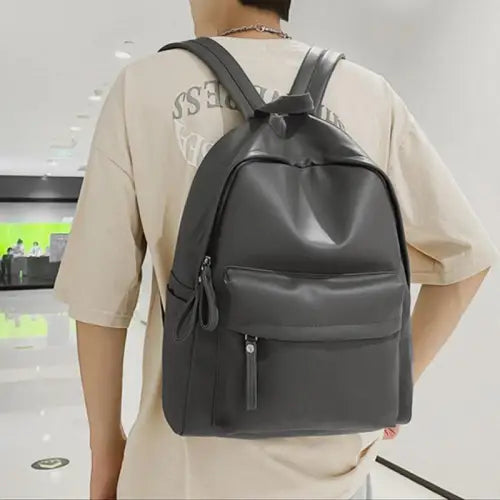 Sleek Black Leather Zip Backpack Bag