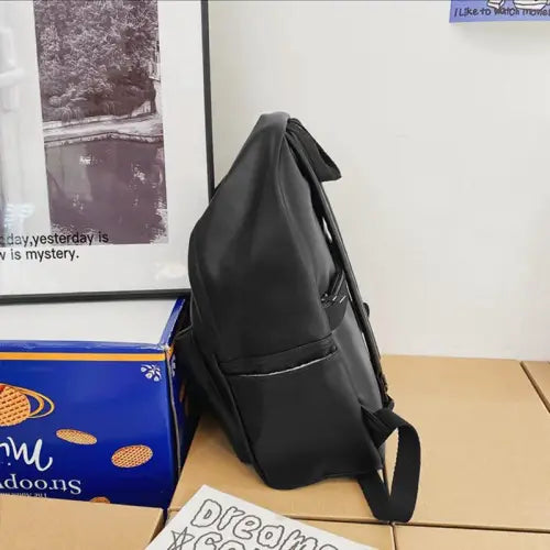 Sleek Black Leather Zip Backpack Bag
