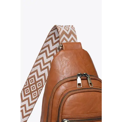 Sleek Brown Leather Sling Bag with Patterned Strap