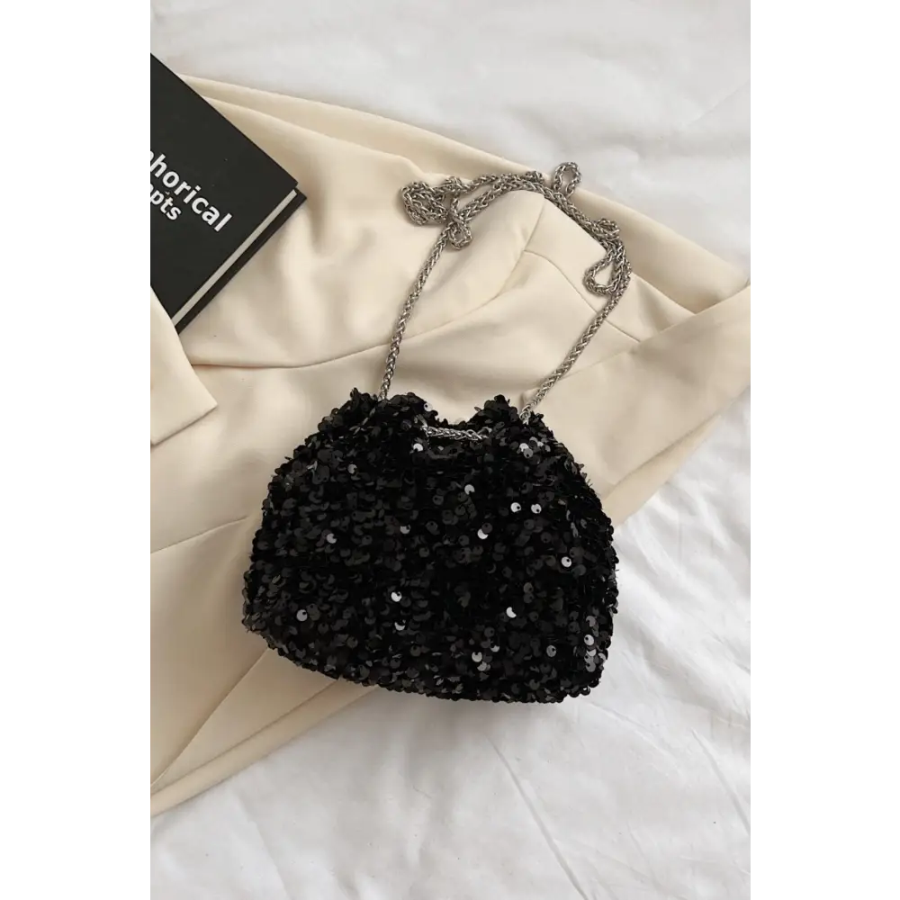 Sparkle in Style with Yeppi Sequin Chain Drawstring Bucket Bag